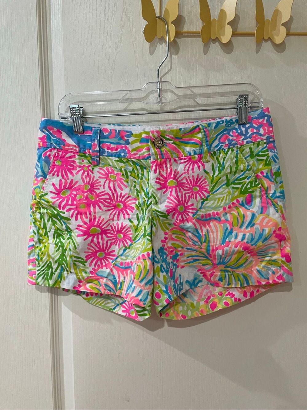 Lilly Pulitzer Callahan Shorts in the vibrant "Lovers Coral" floral print
